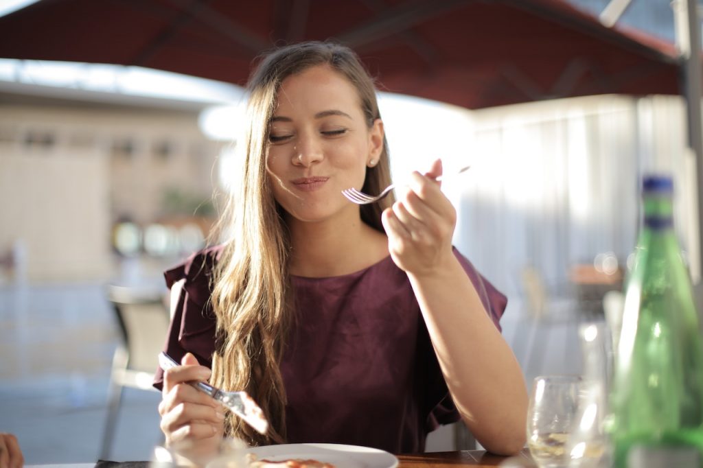 girl eating in the restaurant